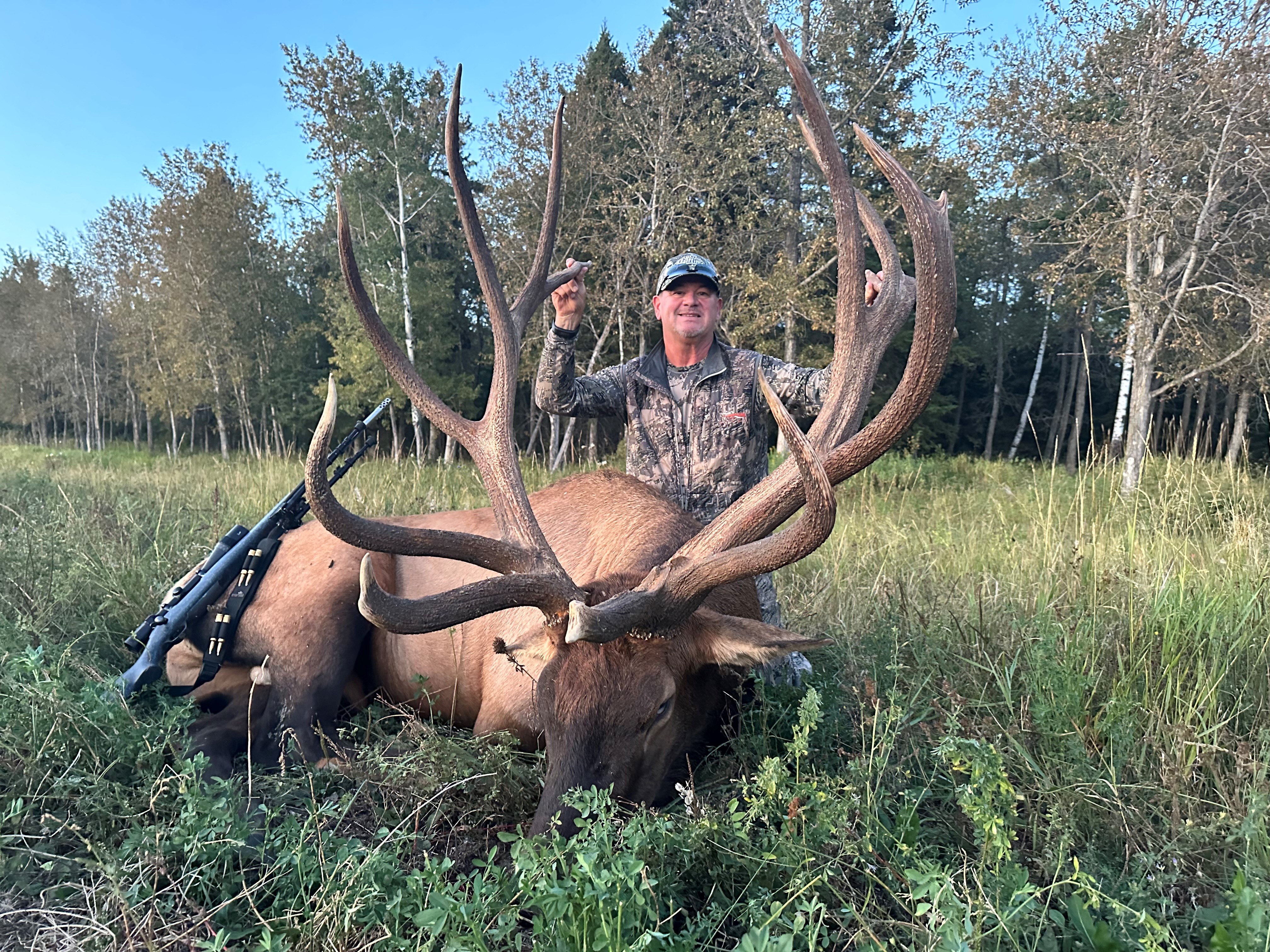 John Enott from Montana with trophy bull elk at Echo Lake Hunts in Saskatchewan