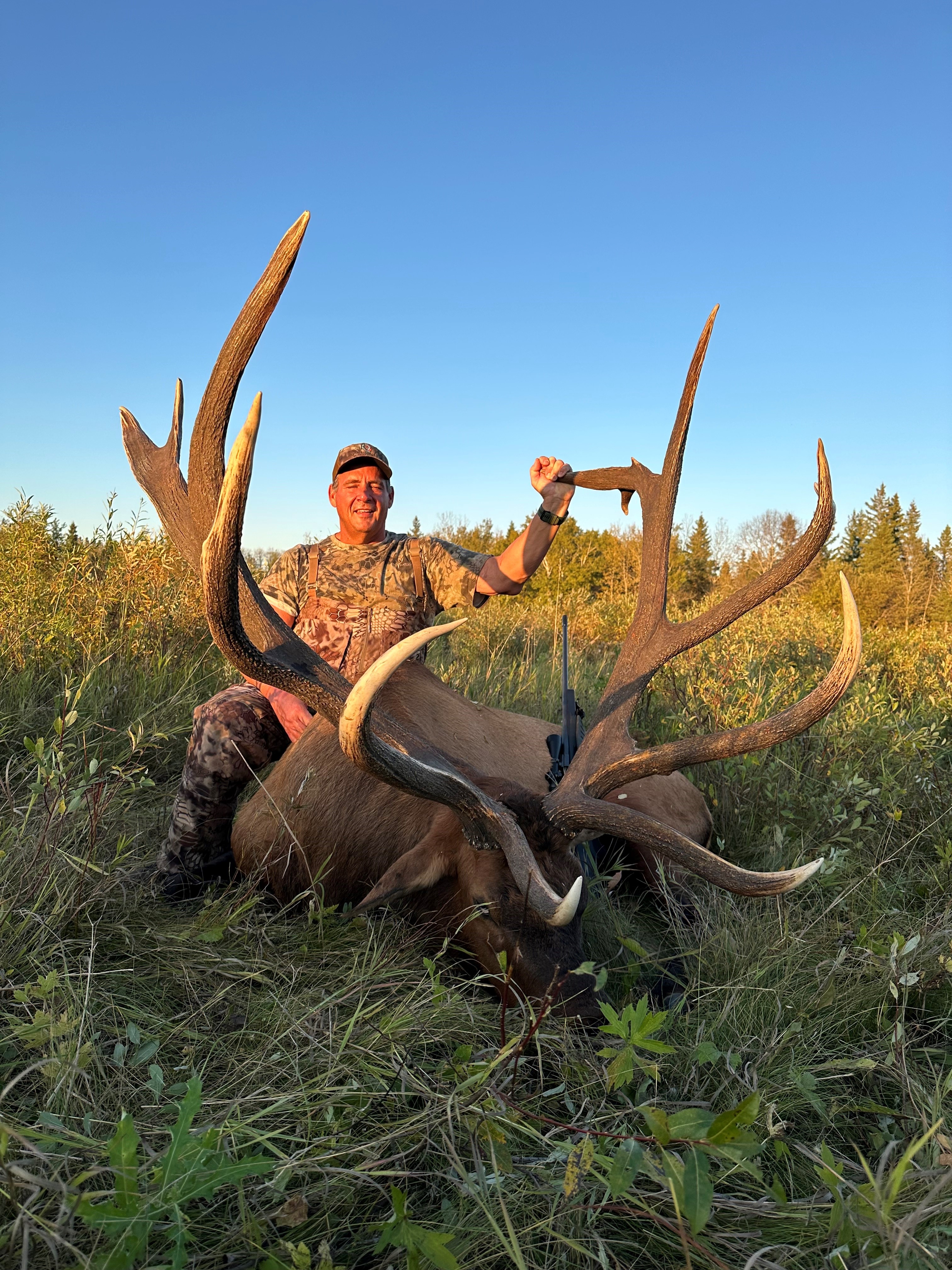 Keith Sanborn from Texas with trophy bull elk at Echo Lake Hunts in Saskatchewan