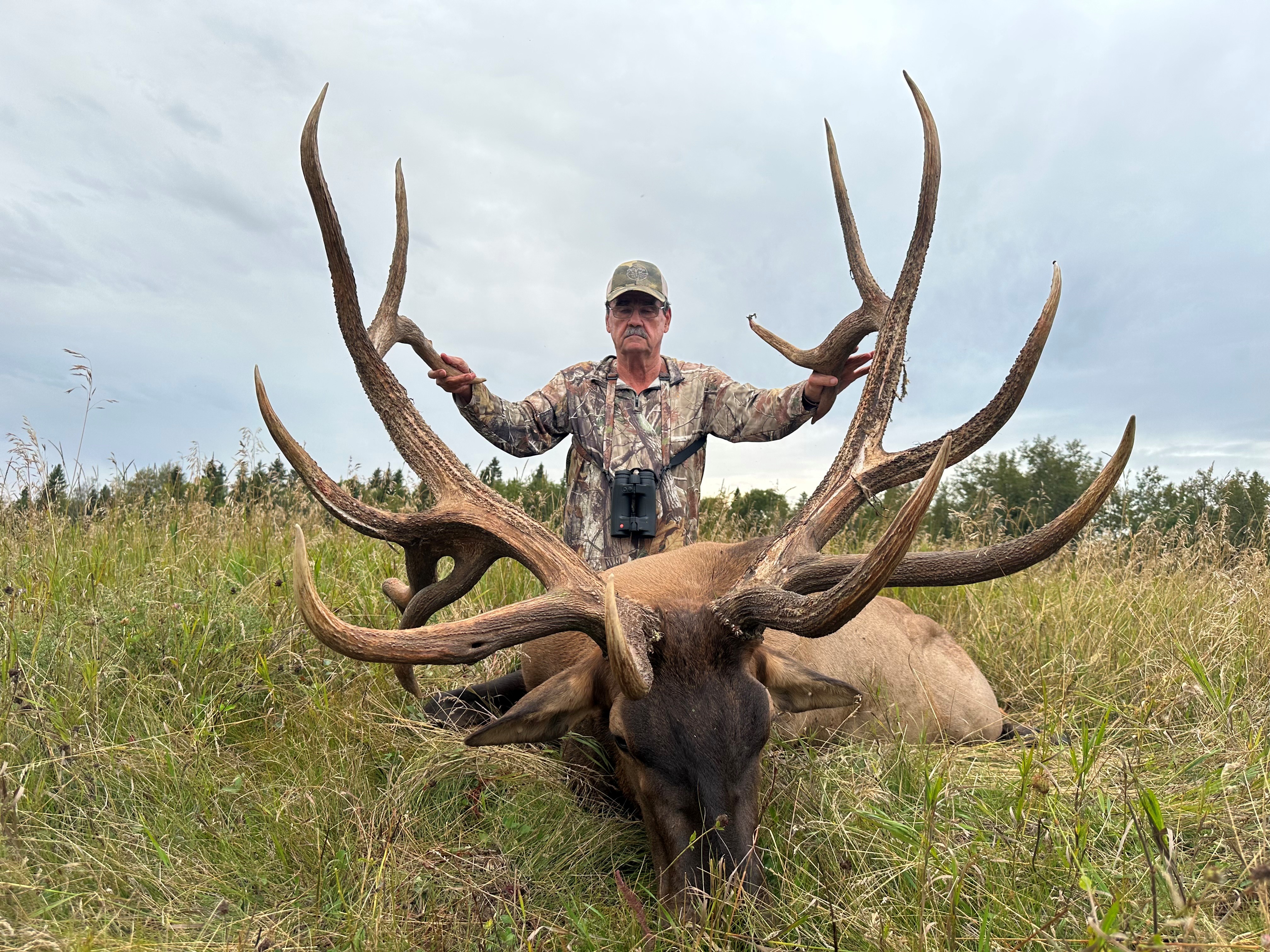 Rankin Smith from Georgia with trophy bull elk at Echo Lake Hunts in Saskatchewan