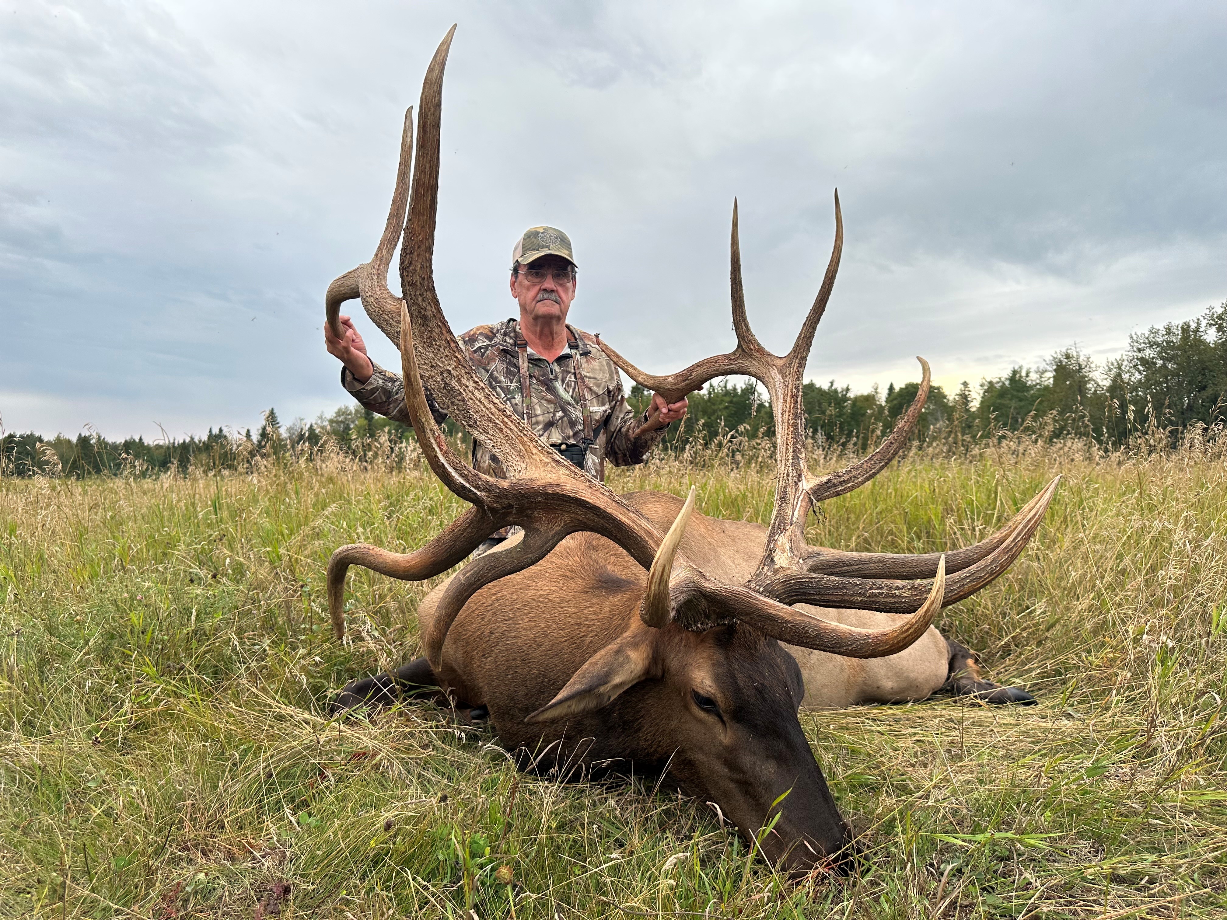 Rankin Smith from Georgia with trophy bull elk at Echo Lake Hunts in Saskatchewan