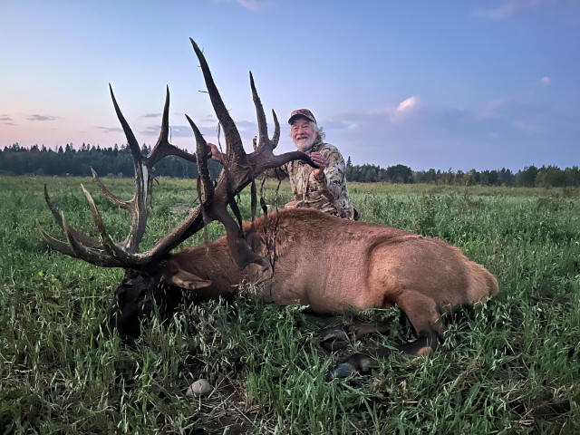 Charles Hager from Montana with trophy bull elk at Echo Lake Hunts