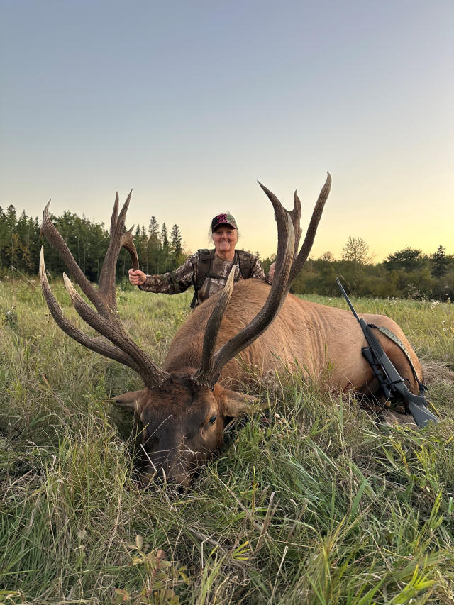 Lorien Clark from Iowa with trophy bull elk at Echo Lake Hunts