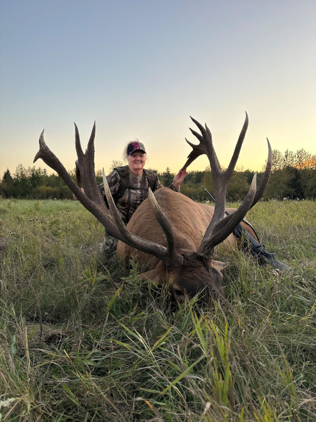 Lorien Clark from Iowa with trophy bull elk at Echo Lake Hunts