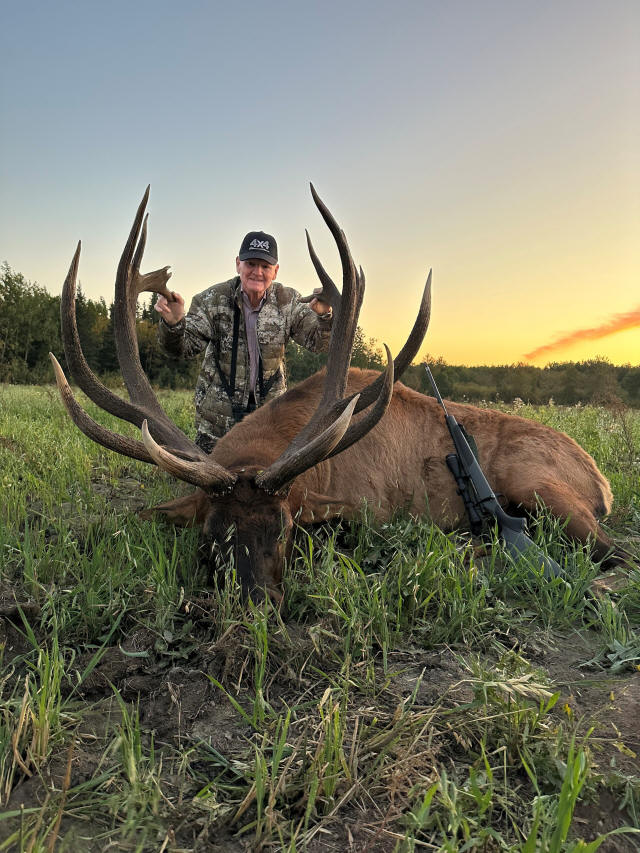 Wayne Ensign from Iowa with trophy bull elk at Echo Lake Hunts