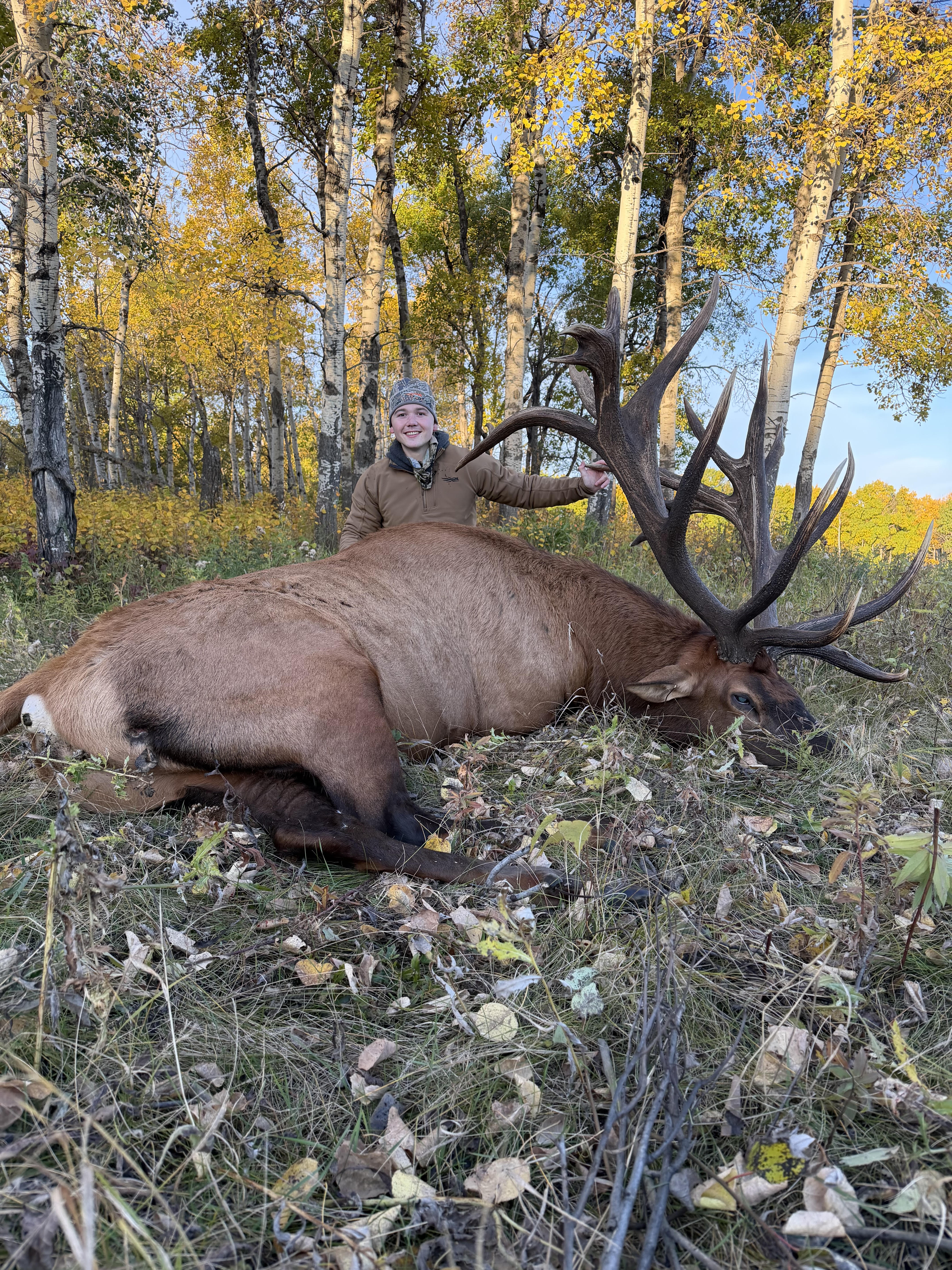 Grant Anderson from Florida with a trophy bull elk at Echo Lake Hunts in Saskatchewan