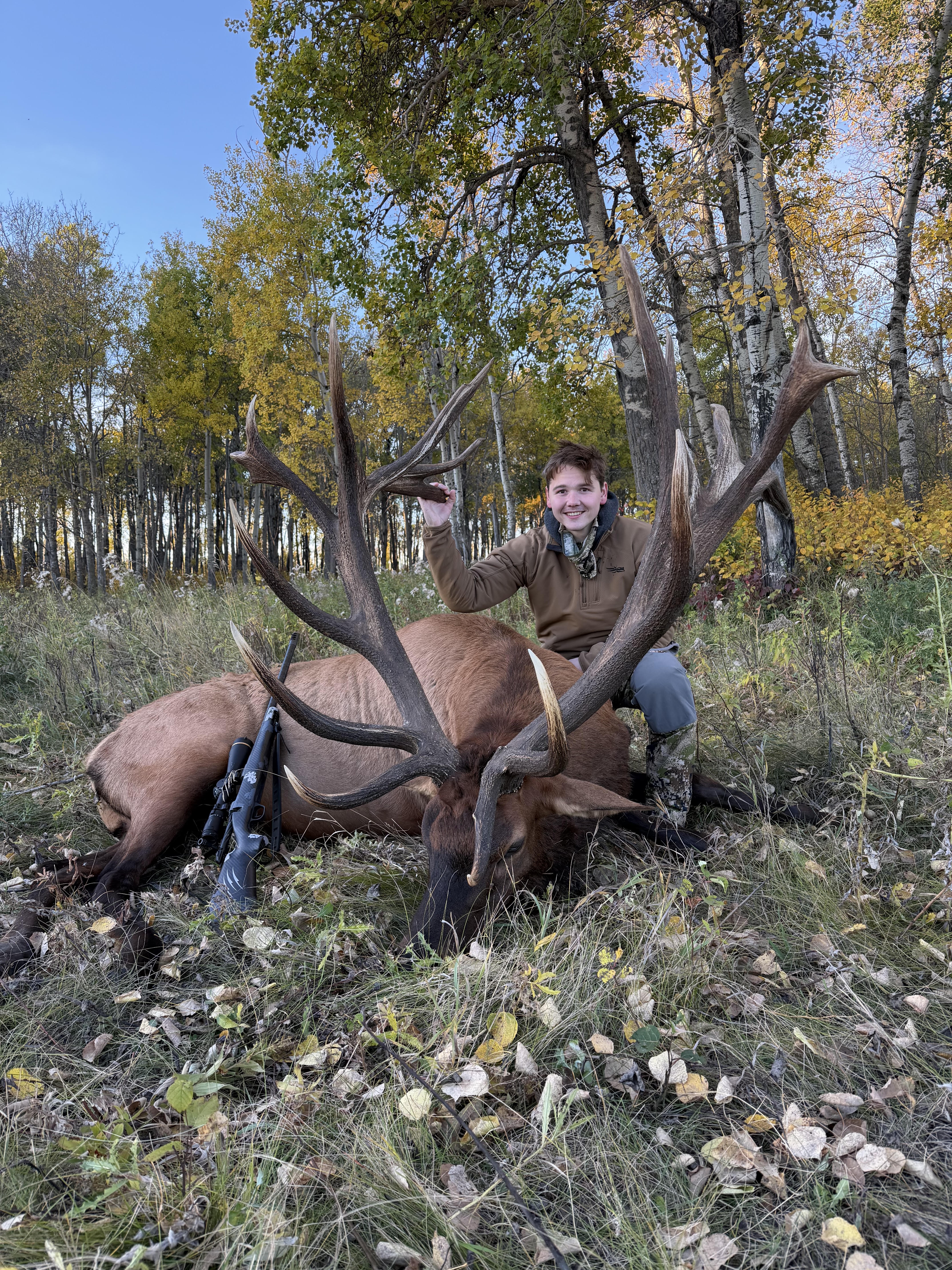 Grant Anderson from Florida with a trophy bull elk at Echo Lake Hunts in Saskatchewan