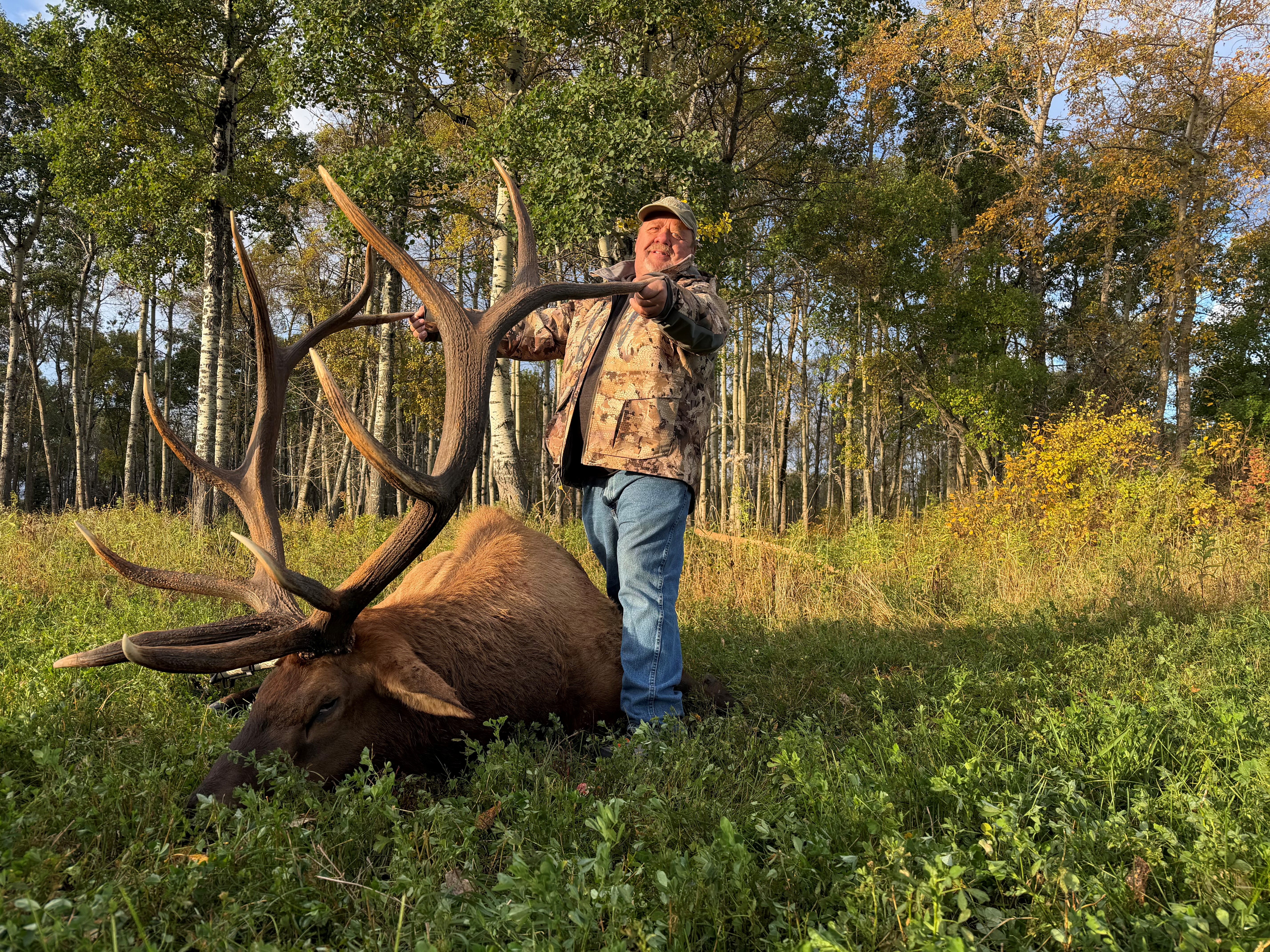 Joe Gillespie from Montana with a trophy bull elk at Echo Lake Hunts in Saskatchewan