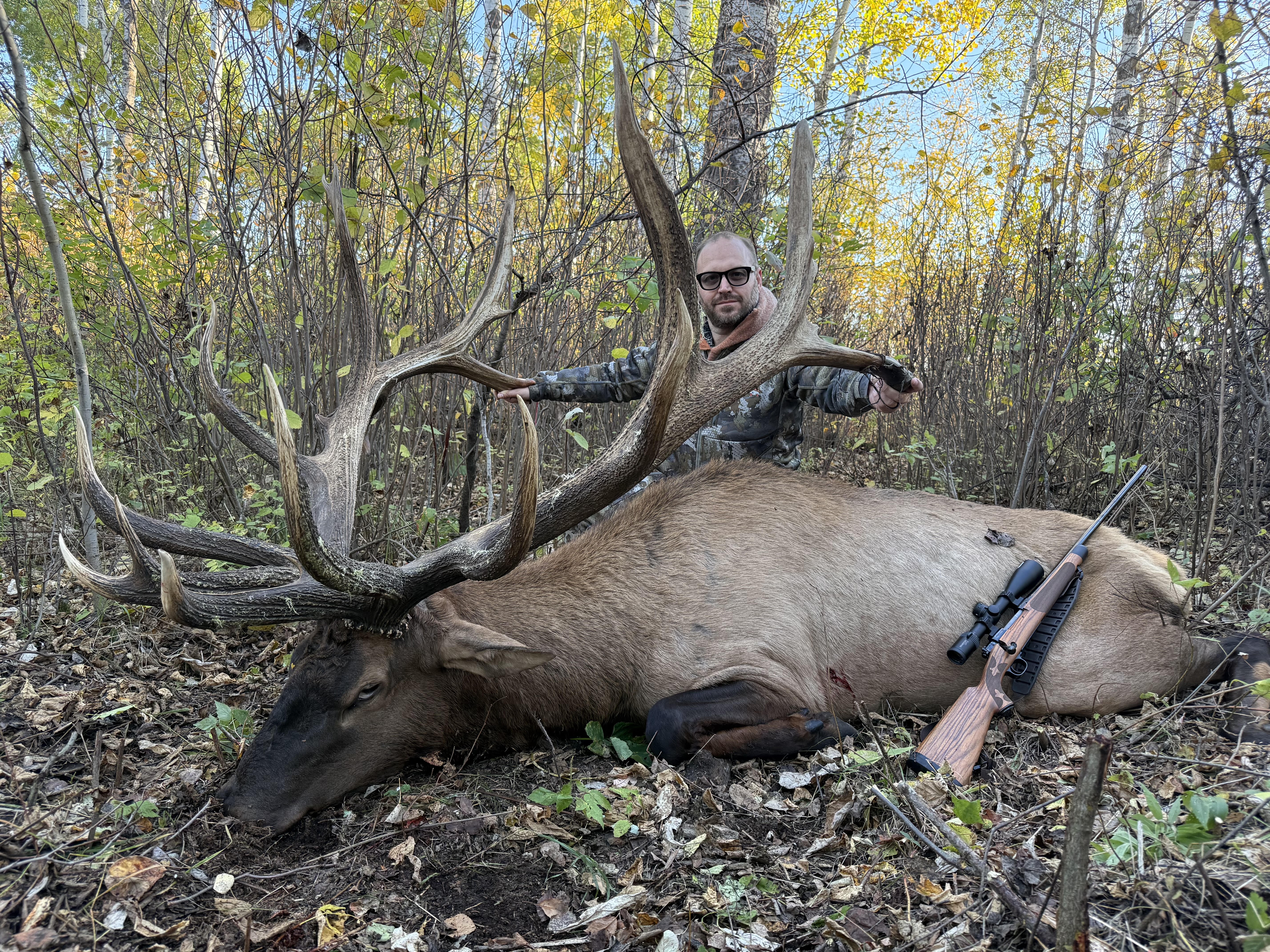 Lars Offerdahl from Minnesota with a trophy bull elk at Echo Lake Hunts in Saskatchewan