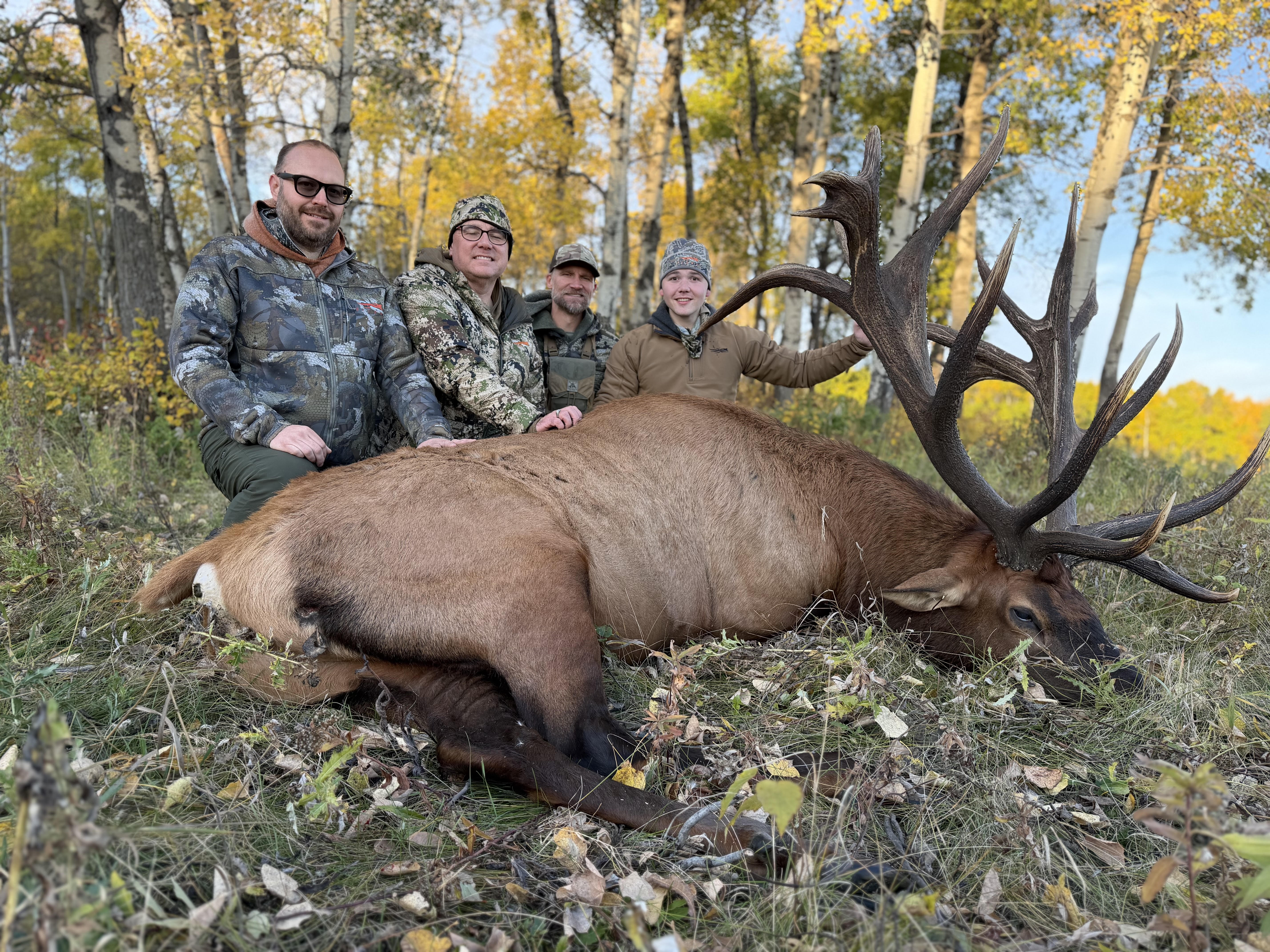 Lars, Scott, Nathon and Grant with a trophy bull elk at Echo Lake Hunts in Saskatchewan