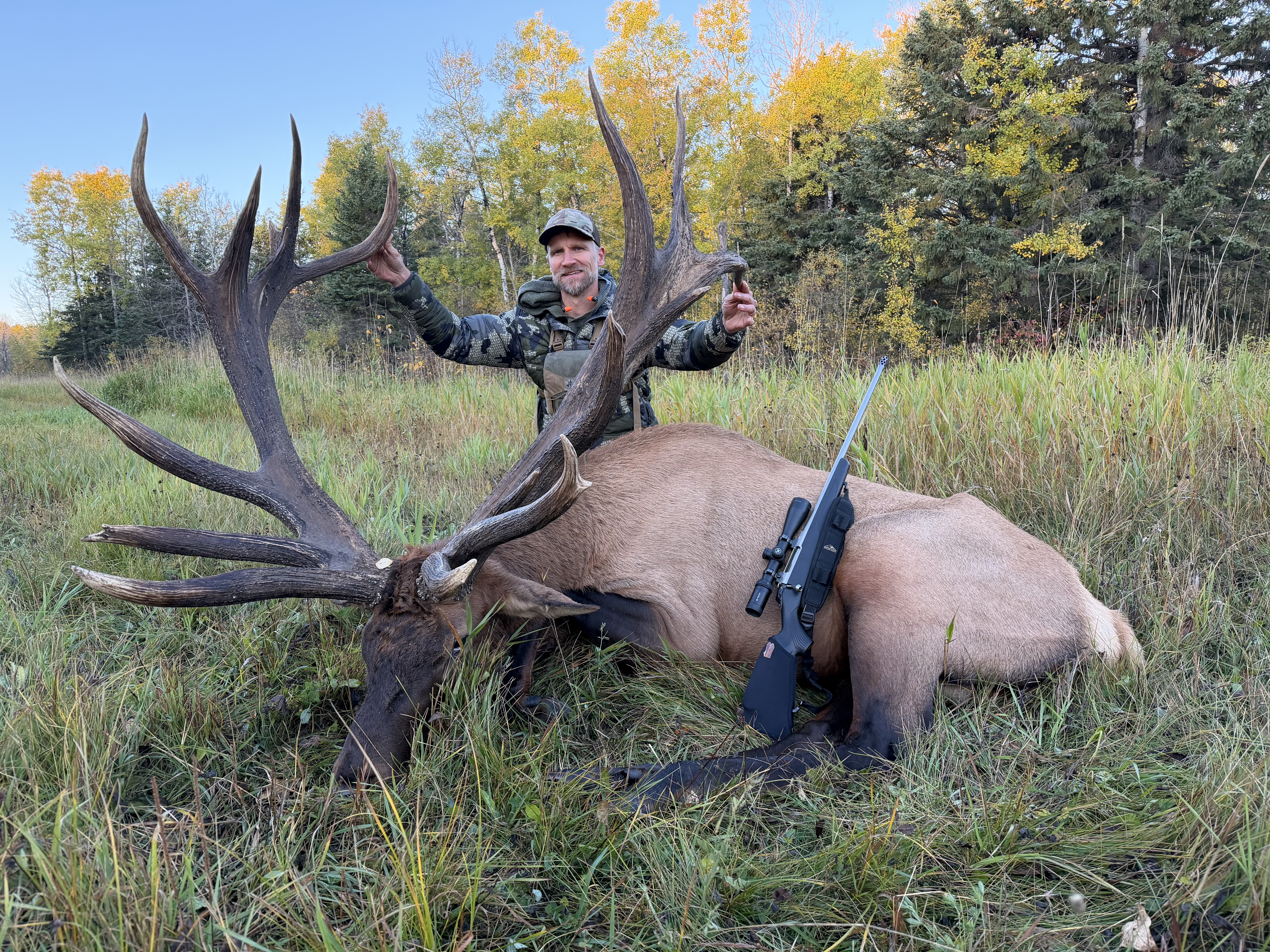 Nathon Anderson from Montana with a trophy bull elk at Echo Lake Hunts in Saskatchewan
